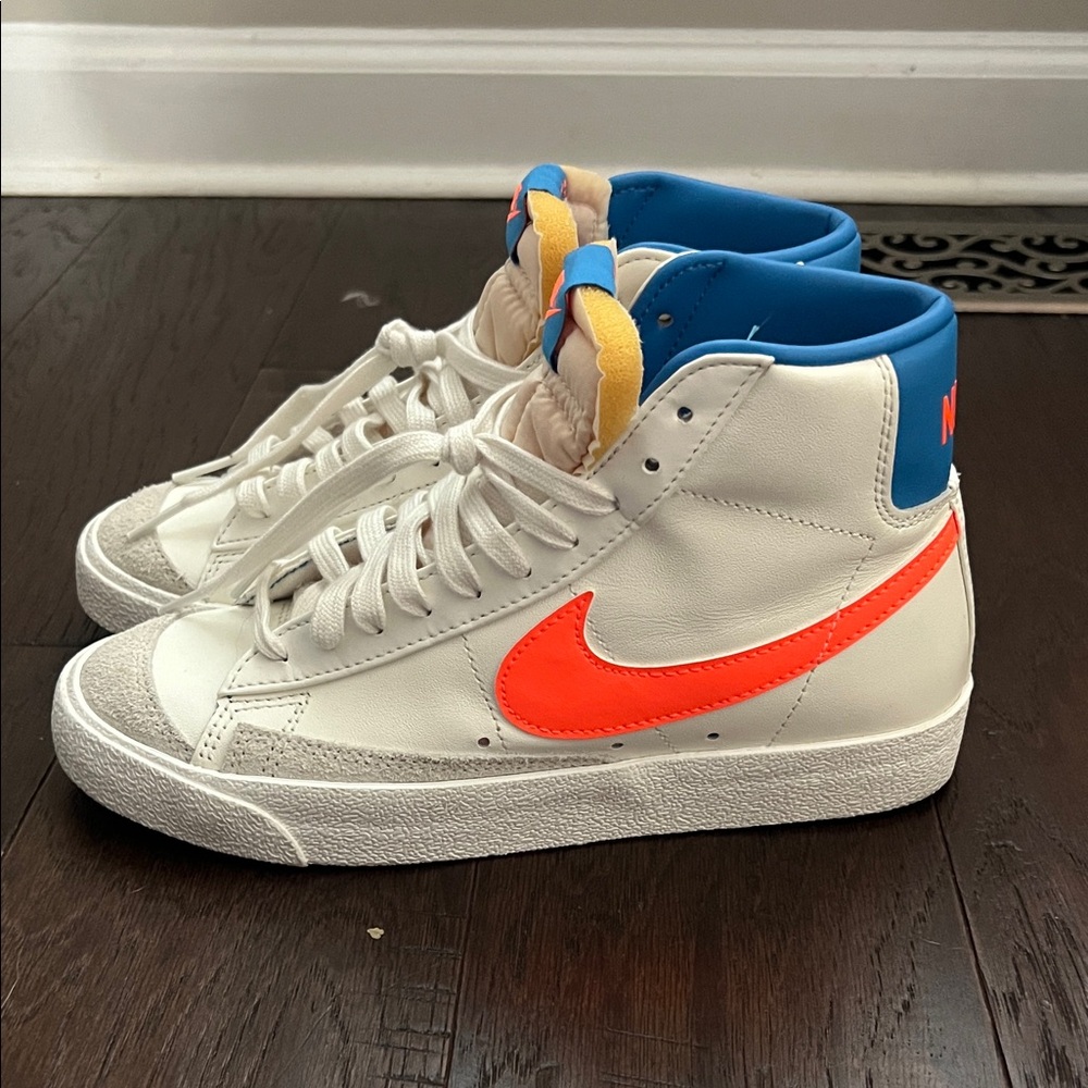 Nike White and Orange High-Top Sneakers with Blue Details